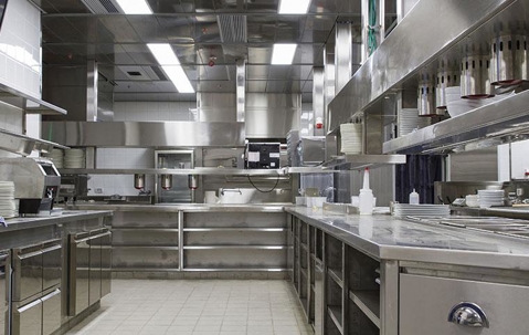 Industrial stainless steel kitchen in a restaurant.